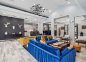 Thumbnail 25 of 47 - resident clubhouse with seating and kitchen