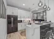 Thumbnail 27 of 47 - resident kitchen with stainless steel appliances
