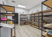 Thumbnail 46 of 47 - package storage room with shelves