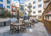 Thumbnail 5 of 37 - picnic and lounging areas around the pool with access to grilling stations