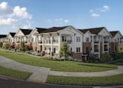 Thumbnail 1 of 29 - a row of townhouses on a street with grass