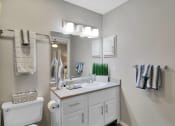Thumbnail 52 of 77 - our apartments offer a bathroom with a sink and a toilet