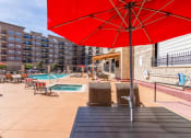 Thumbnail 3 of 19 - our apartments have a pool and lounge area with umbrellas