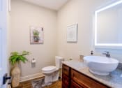 Thumbnail 19 of 19 - a bathroom with a sink and a toilet