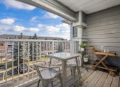 Thumbnail 7 of 37 - Outdoor patio with a seating area and parking lot view