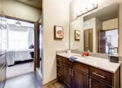 Thumbnail 12 of 39 - Spacious Bathroom with Modern Cabinets and Granite Countertops | Nashville, TN | 909 Flats