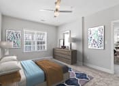 Thumbnail 3 of 30 - A bedroom with a bed, dresser, and ceiling fan.