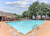 Thumbnail 12 of 23 - A large swimming pool with the word "ENTRANCE" written on the ground.