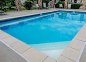 Thumbnail 23 of 28 - A rectangular pool with a white border.