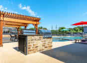 Thumbnail 8 of 16 - our apartments showcase a swimming pool