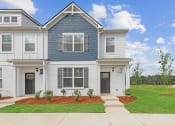 Thumbnail 1 of 25 - exterior of townhomes