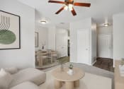 Thumbnail 2 of 25 - an open living room and dining room with a ceiling fan
