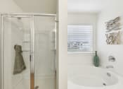 Thumbnail 18 of 25 - spacious shower and tub