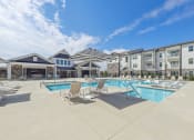 Thumbnail 3 of 36 - our apartments have a pool and lounge areas with chairs