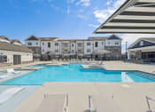 Thumbnail 2 of 36 - our apartments have a large swimming pool with chairs and umbrellas