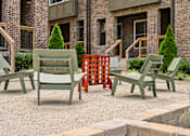 Thumbnail 148 of 149 - A set of four chairs are arranged in a circle on a patio.