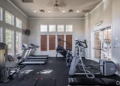 Thumbnail 17 of 32 - the gym is equipped with cardio equipment and weights