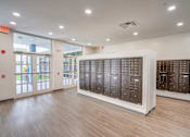 Thumbnail 16 of 24 - the building has a locker room at the front of it