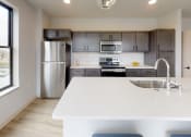 Thumbnail 44 of 61 - Amenity, Luxury, Resident, Apartment, High End, Modern Finishes, LVP Flooring, Quartz Countertops, Stainless Steel Appliances, High Ceilings, In Unit Washer and Dryer