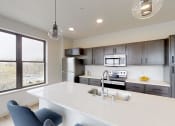 Thumbnail 41 of 61 - Amenity, Luxury, Resident, Apartment, High End, Modern Finishes, LVP Flooring, Quartz Countertops, Stainless Steel Appliances, High Ceilings, In Unit Washer and Dryer