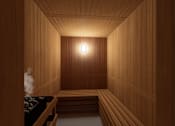 Thumbnail 8 of 21 - A wooden room with a light on the wall and a bench at the bottom.