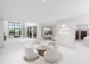 Thumbnail 13 of 21 - A white room with a table and chairs and a wall with the words "this must be the place".