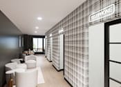 Thumbnail 16 of 21 - A modern office with a telephone sign on the wall.