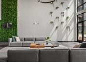 Thumbnail 38 of 61 - a living room with a white wall with plants on it and a gray couch