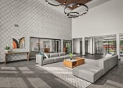 Thumbnail 32 of 61 - a living room with couches and a coffee table