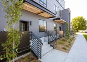 Thumbnail 5 of 84 - Green space and oversized patios at The Landing at 1001 NP, Fargo, North Dakota, 58102