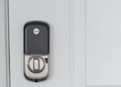 Thumbnail 36 of 84 - An open door with a silver door handle and a black handle on a white door at 1001 NP, Fargo, North Dakota 58102