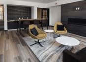 Thumbnail 11 of 84 - Lounge area in the community room at The Landing at 1001 NP, Fargo, ND 58102