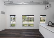Thumbnail 2 of 84 - Carpeted Living Room at The Landing at 1001 NP, Fargo, ND, 58102
