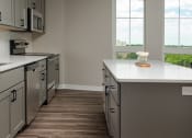 Thumbnail 4 of 50 - Kitchen at Dillard Apartments, Fargo, North Dakota 58102