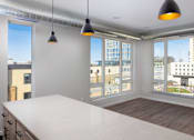 Thumbnail 4 of 60 - Kitchen and dining at Kesler Apartments in Downtown Fargo, Fargo, ND, 58102