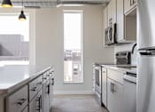 Thumbnail 2 of 60 - Kitchen at Kesler Apartments in Downtown Fargo, Fargo, ND 58102