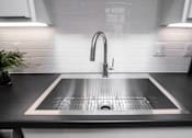 Thumbnail 9 of 26 - Sink in the kitchen at Bostad Apartments, Fargo, ND 58102