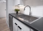 Thumbnail 12 of 26 - Kitchen sink at Bostad Apartments, Fargo, ND, 58102
