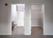 Thumbnail 18 of 37 - a bathroom with a toilet and a sink at RoCo Apartments, Fargo, ND 58102