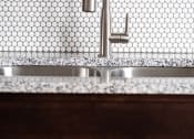Thumbnail 15 of 37 - a kitchen with a sink and a faucet at RoCo Apartments, Fargo, ND 58102