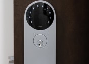 Thumbnail 21 of 37 - a white door handle with a small screen on it  at RoCo Apartments, Fargo, ND, 58102