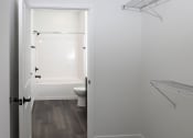 Thumbnail 55 of 84 - a bathroom with a toilet and a bathtub at The Landing at 1001 NP, Fargo, ND, 58102