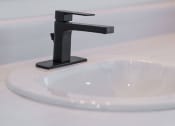 Thumbnail 58 of 84 - a bathroom sink with a black sink faucet at The Landing at 1001 NP, Fargo, ND 58102