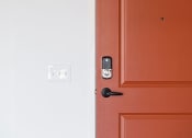 Thumbnail 64 of 84 - a red door with a white door next to it at The Landing at 1001 NP, Fargo, North Dakota 58102
