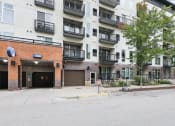 Thumbnail 30 of 86 - an empty parking lot in front of an apartment building