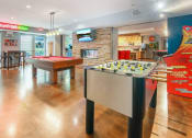 Thumbnail 24 of 86 - two pool tables in a game room with a bar