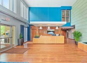Thumbnail 19 of 86 - the lobby or reception area of a hotel with a reception desk