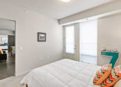 Thumbnail 37 of 86 - a bedroom with a bed and a large number 7 on the wall