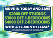 Thumbnail 2 of 86 - A promotional image offering discounts on studios and bedrooms for a 12-month lease.