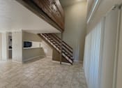 Thumbnail 2 of 19 - Spacious loft living room in a Sierra Ranch apartment home in San Antonio, TX.